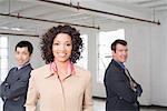 Portrait of Businesswoman with other Business People in Background