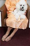 Woman in Hair Salon with Poodle