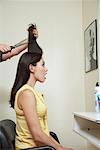 Woman Getting Haircut at Hair Salon