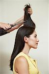 Woman Getting Haircut at Hair Salon