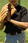 Close-up of a baseball player standing in a baseball field