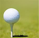 Close-up of a golf ball on a tee