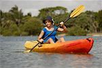 Teenage girl kayaking