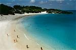 Large group of people holidaying on Horseshoe bay beach, Bermuda