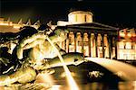 View of the Trafalgar fountain statue at night, London, England