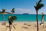 Large group of people are sunbathing on deck chairs, St. Martin, Leewards Islands, Caribbean