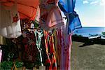 Dresses are displayed for sale at a souvenir stand on the island of Martinique.