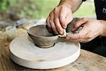 Man's Hands Making Bowl