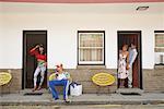 Couple Looking at Other Couple at Motel