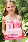 Girl Holding Birthday Gifts