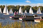 Two Couple on Docks, Watching Sailboat Race, Bobcaygeon, Ontario, Canada