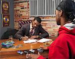 Record Executive Signing Papers for Hip Hop Artist