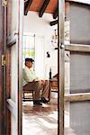 Man Sitting in Room