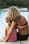 Mother and Daughter by Pool Side