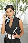 Businesswoman Using Cellular Phone