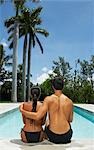 Couple Sitting at Pool