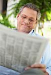 Portrait of Man Reading Newspaper