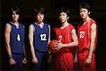Four young Asian basketball players