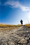 Male hiker on track