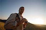 Hiker with binoculars