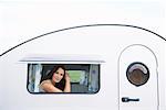 Woman Looking out Trailer Window
