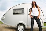 Woman Standing in Front of Trailer