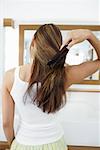 Woman Brushing Hair