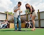 Couple Playing Golf