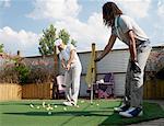 Friends Playing Golf