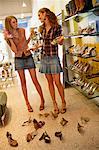 Teenaged Girls Shopping For Shoes