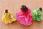 High angle view of three young women dancing