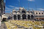 Tourists in front of a cathedral, St. Mark's Cathedral, Venice, Veneto, Italy