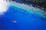 Aerial view of a boat in the ocean, Hawaii, USA