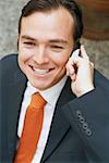 Close-up of a businessman talking on a mobile phone