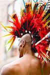 Rear view of a gay man wearing a colorful headdress
