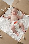 Baby in Cardboard Box