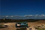 Man Lying on Sofa Outdoors