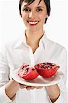 Woman Holding Pomegranate