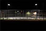 Empty Tennis Court at Night