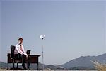 Businessman at Desk Outdoors