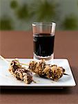 Pork Skewers with Peanuts and Red Wine