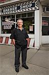 Portrait of Barber by Shop