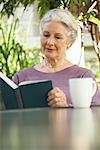 Portrait of Woman Reading Book