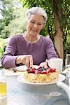 Woman Cutting Cake