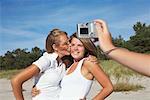 Girls Taking Picture at Beach