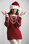 Woman Wearing Santa Hat and Garland