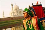 Close-up of a young man standing at the riverbank, Taj Mahal, Agra Uttar Pradesh, India
