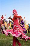 Side profile of a female performer dancing, Elephant Festival, Jaipur, Rajasthan, India
