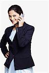 Portrait of a businesswoman talking on a mobile phone and smiling