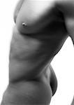 Man's bare torso, view from the side, close up, b&w